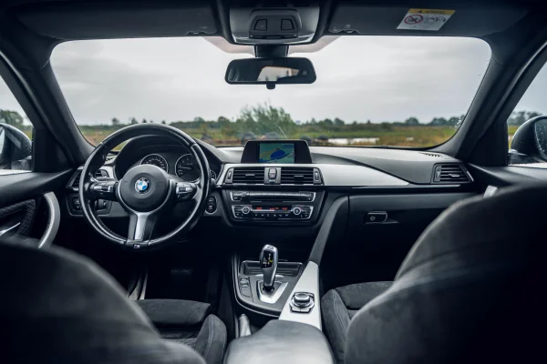 achtergrondafbeelding voor occasion BMW 316i Touring uit 2014