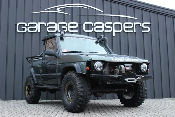 achtergrondafbeelding voor occasion Land Rover discovery trayback wedstrijd auto uit 1994