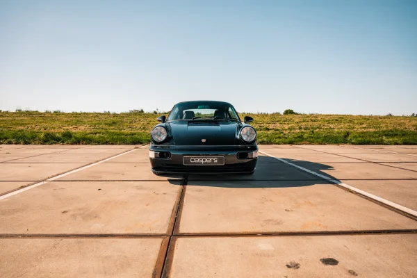 achtergrondafbeelding voor occasion Porsche 911 964 Carrera 2 uit 1990