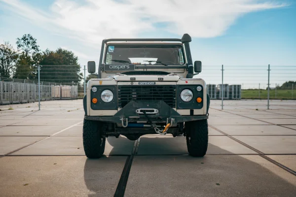 achtergrondafbeelding voor occasion Land Rover Defender 90 TD5 Soft-Top uit 1999