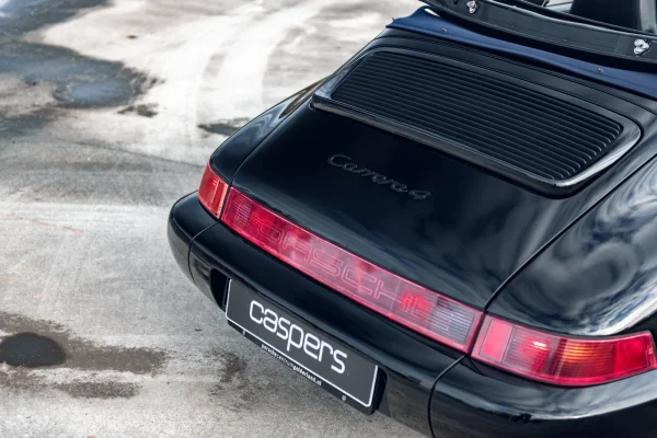 achtergrondafbeelding voor occasion Porsche 911 964 Carrera 4 uit 1990