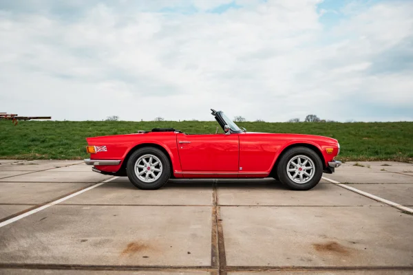 achtergrondafbeelding voor occasion Triumph TR6 Cabrio uit 1974